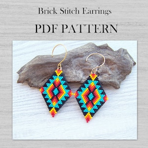 May include: A pair of diamond-shaped beaded earrings with a geometric pattern in turquoise, red, yellow, and black colours. The earrings are attached to gold-coloured hooks. The image includes the text "Brick Stitch Earrings PDF PATTERN".