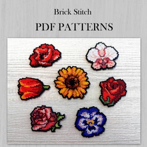 May include: A set of six brick stitch flower patterns, including a sunflower, a rose, a tulip, an orchid, a pansy, and another rose. The patterns are printed on white paper with the text "Brick Stitch PDF Patterns".