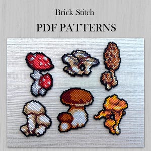 Op de afbeelding: Zes verschillende paddenstoelontwerpen voor kralen, met behulp van de baksteen-steektechniek. De paddenstoelen zijn in verschillende kleuren, waaronder rood, bruin, wit en geel.