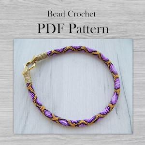 May include: A purple and gold beaded necklace with a snake-like clasp. Bead Crochet PDF Pattern.