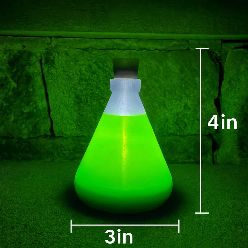 May include: A glowing green potion bottle, 4 inches tall and 3 inches wide, with a black stopper and a white neck. The bottle is filled with a bright green liquid, creating a magical or fantasy aesthetic.