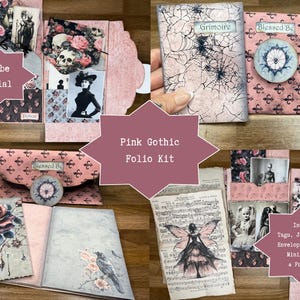 May include: A pink gothic folio kit featuring paper ephemera, including tags, journal cards, envelopes, and a mini notebook. The collection displays motifs of skulls, roses, spiders, webs, and vintage figures, with text labels reading Grimoire and Blessed Be.