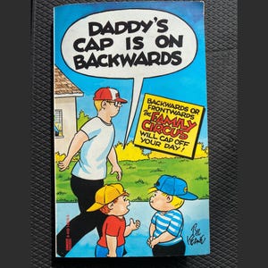 Komiks Rodzina Cyrk Czapka tatusia jest na odwrót Miękka oprawa ISBN 0449148165 Gazeta Komiksy Bil Keane