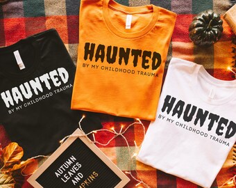 Haunted by My Childhood Trauma; Funny Halloween; Spooky Season - Unisex Jersey Short Sleeve Tee