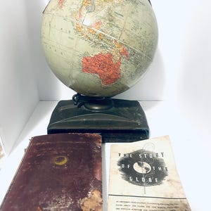 Replogle Globe with Atlas and Paperwork