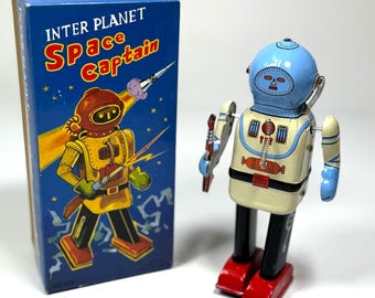 スペースパトロール。ヴィンテージの巻き上げ式ブリキおもちゃのレトロ