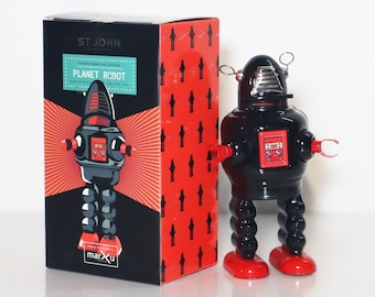 Planet Robot.Vintage Wind Up Tin Toy Retro Collectible Black Robot.Design and production by Saint John