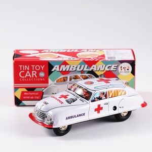 Ambulance.Vintage Wind Up Tin Toy Retro Collectible Car.Design and production by Saint John.Gifts for her.Gift for kids.Christmas gift idea
