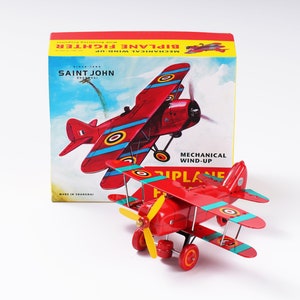 Doppeldecker Fighter.Vintage Wind Up Blech Spielzeug Retro Sammler Plane.Design und Produktion von Saint John.Geschenk für Kinder.Weihnachten Geschenkidee