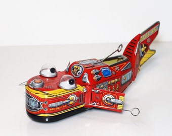 Space Whale Red.Vintage Wind Up Tin Toy Retro Collectible Whale.Design and production by Saint John