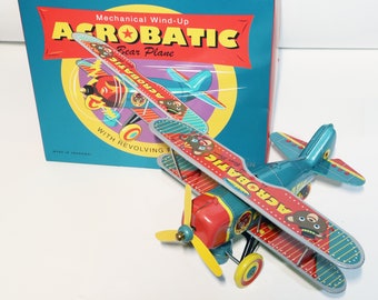 Acrobatic Bear Plane.Vintage Wind Up Tin Toy Retro Collectible Plane.Design and production by Saint John.Gift for kids.Christmas gift idea.