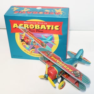 Acrobatic Bear Plane.Vintage Wind Up Blech Spielzeug Retro Sammler Plane.Design und Produktion von Saint John.Geschenk für Kinder.Weihnachten Geschenkidee.