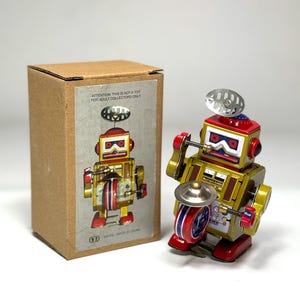 ピストンアクションロボット ロビー・ザ・ロボット ブリキ製 電池式