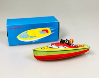 Candle Boat.Vintage Tin Toy Retro Collectible Boat.Design and production by Saint John
