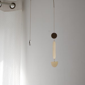 Mobile model Electra #3. Brass mobile. Light sensor. Handmade. To offer. Interior decoration