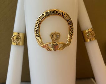 Elegant and very special 3 piece Claddagh Unity Candle Set which symbolizes Friendship, Loyalty and Love. Pillar candle is 8 inches tall.