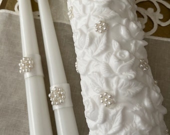 Beautiful 3 piece Unity Candle Set. Embossed roses with pearls and tapers complete the elegance. Pure white and lovely! Free Shipping.