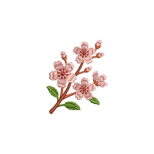 以下が含まれることがあります： ピンク色の桜の花と緑の葉が付いた枝を特徴とする刺繍された花の模様。 花は、より濃いピンク色の中心部を持つ、詳細で質感のある外観をしています。 枝は茶色で、葉は鮮やかな緑色です。