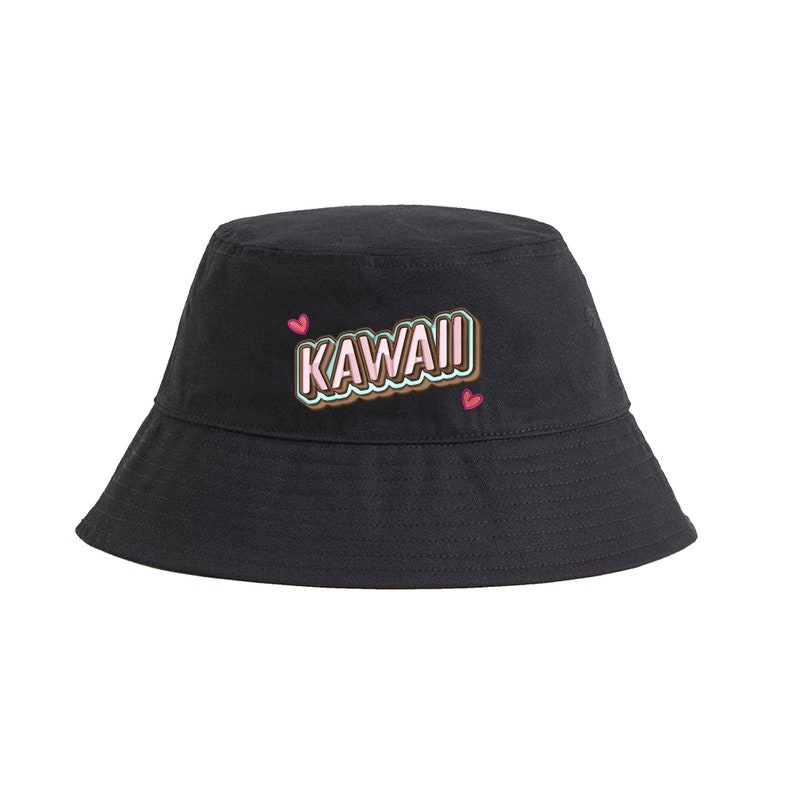 May include: Black bucket hat with the word "KAWAII" in pink, brown, and green letters with a white outline. Two pink hearts are on either side of the word.