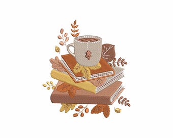 May include: An embroidery design featuring a beige mug with a tea bag tag, resting on a stack of three books in shades of orange, yellow, and brown. The composition is surrounded by various autumn leaves and small branches in warm earth tones.