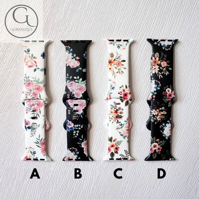 May include: Four Apple Watch bands with floral patterns. The bands are in black and white with pink, orange, and blue flowers. The bands are labeled A, B, C, and D.