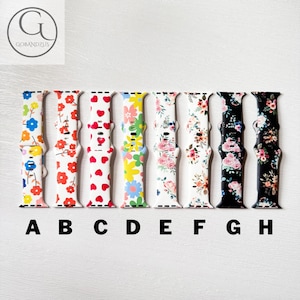 May include: Eight different Apple Watch bands with floral and geometric patterns. The bands are in the colors blue, red, white, yellow, pink, black, and white. The bands are labeled A through H.