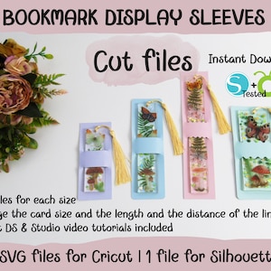 May include: Four styles of bookmark display sleeves, each with a different design featuring butterflies, ferns, and mushrooms. The sleeves are made of clear plastic and have a light blue, pink, or purple backing. The sleeves are designed to be cut with a Cricut or Silhouette cutting machine. The text "Cut files Instant Download" is visible in the top right corner of the image.