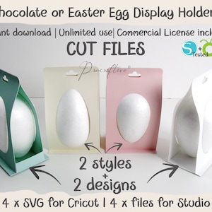 May include: Four digital cut files for creating Easter egg display holders. Two styles are shown: a green holder with a white egg and a pink holder with a white egg. The text "2 styles + 2 designs" is included in the image. The text "4 x SVG for Cricut | 4 x files for Studio" is also included in the image.