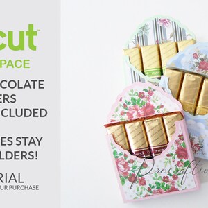 May include: Three different patterned paper boxes with a scalloped edge, each holding a row of Merci chocolate bars. The boxes are in pink, blue, and green. The text "Cricut Design Space" and "Merci Chocolate Holders Add-ons Included" is visible on the left side of the image.