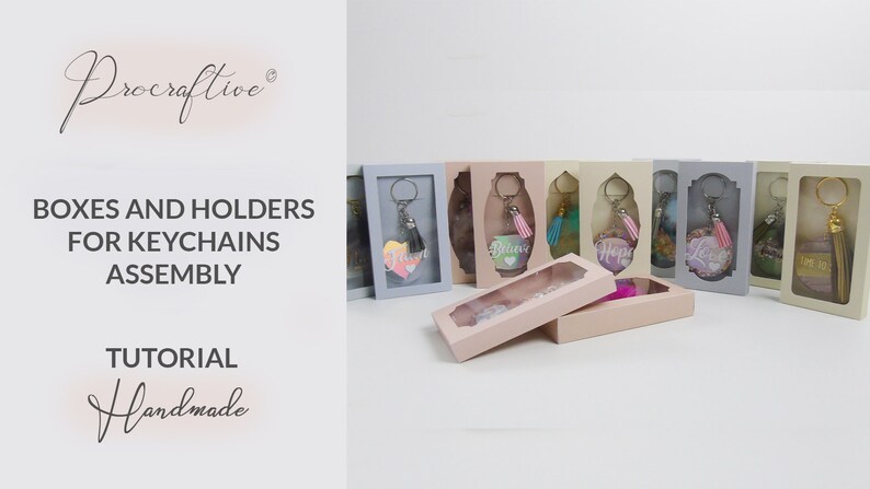 May include: A collection of small, clear boxes with keychains inside. Each box has a different color and features a different word, such as "Believe", "Hope", and "Love". The boxes are arranged in a row on a white surface. The text "Boxes and Holders for Keychains Assembly" is visible in the image.