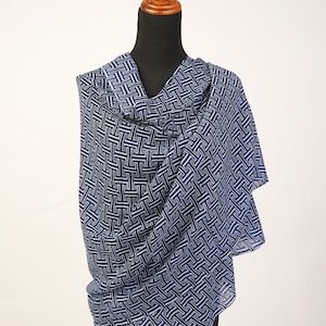 Cornflower and Navy shawl combines the luxurious softness of cashmere and Silk.