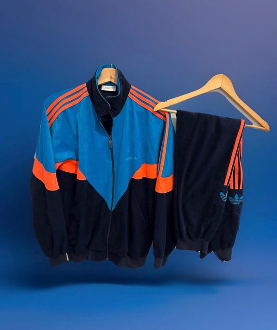 orange and blue adidas tracksuit