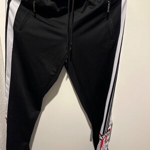 Adidas pants online button down side