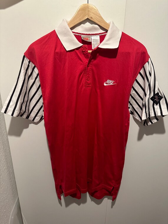 nike supreme court polo