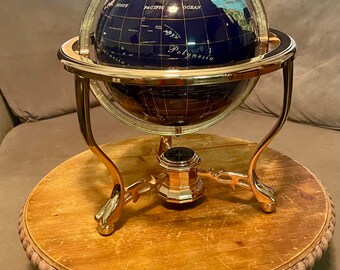 Vintage Lapis Lazuli Globe with Individual Gemstones, Semiprecious Stones and Shells on a Full Meridian Mount and a Brass Lion Foot Stand.