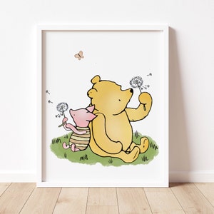 Winnie the pooh and piglet sitting in the grass blowing on a cotton flower