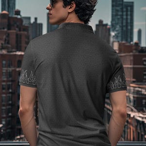 cool shirt, featuring a subtle geometric pattern and fierce flame details on the sleeves. This design isn’t just about looks; it’s a statement of understated rebellion and bold style.
