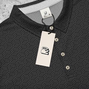 May include: Black polo shirt with a geometric pattern and a white tag with a logo. The tag says "M.N.K.2" and "Made in China".