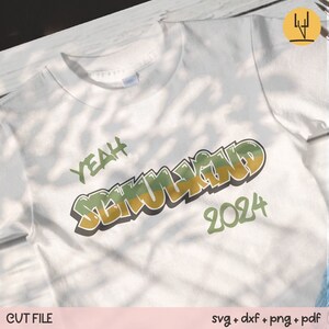 May include: White t-shirt with the words "YEAH SCHULKIND 2024" in a green and yellow graffiti style. The shirt is made of a soft material and is suitable for children. The design is a cut file.