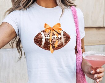 Coquette Football Baby Tee: Orange Bow Faux Glitter, Girly Game Day Top