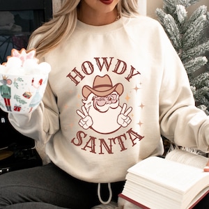 Howdy Santa Cowboy Christmas Sweatshirt: Western Holiday Apparel