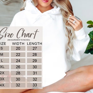 May include: Size chart for a white hoodie with measurements in inches. The chart shows the size, width, and length of the hoodie in inches. Sizes include S, M, L, XL, 2X, 3X, and 4X.