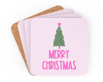 Peut inclure: Ensemble de quatre sous-verres roses avec un sapin de Noël vert et le texte "Joyeux Noël" en rose.