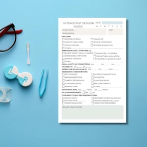 May include: An optometrist session notes form with checkboxes and fields for patient information, visit type, and observations. Contact lens case, tweezers, and glasses are on a blue surface.