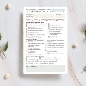 May include: Occupational Therapy Session Notes (Adult) form. The white paper has checkboxes for various treatment areas and interventions. The form includes sections for client information, session focus, interventions, and client performance. The background is a light beige with scattered decorative elements.