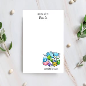 May include: White notepad with the text "From the Desk of Nicole" at the top. A colorful illustration of cleaning supplies, including hand sanitizer, soap, gloves, a mask, and a mop, is at the bottom. The words "Environmental Services" are below the illustration.