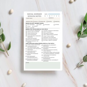 May include: A Social Worker Session Notes notepad with checkboxes for session type, reason for visit, and tasks completed. The notepad is white with a green border and text in black. The notepad is designed for tracking client sessions.