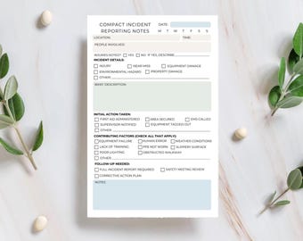 May include: A white and light blue compact incident reporting notes form. The form includes sections for incident details, initial action taken, contributing factors, and follow-up needed. The text "Compact Incident Reporting Notes" is at the top.