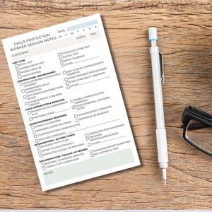 May include: A Child Protection Worker Session Notes form with checkboxes, a white mechanical pencil, a pair of black glasses, and a cup of coffee on a wooden surface. The form includes sections for visit type, observations, and interventions.