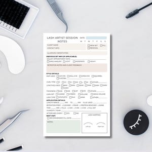 May include: A white lash artist session notes sheet with text including "LASH ARTIST SESSION NOTES" and sections for client information, style details, and application details. Various lash tools surround the sheet.